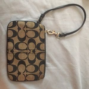 Authentic 💕 Brown and black coach wristlet